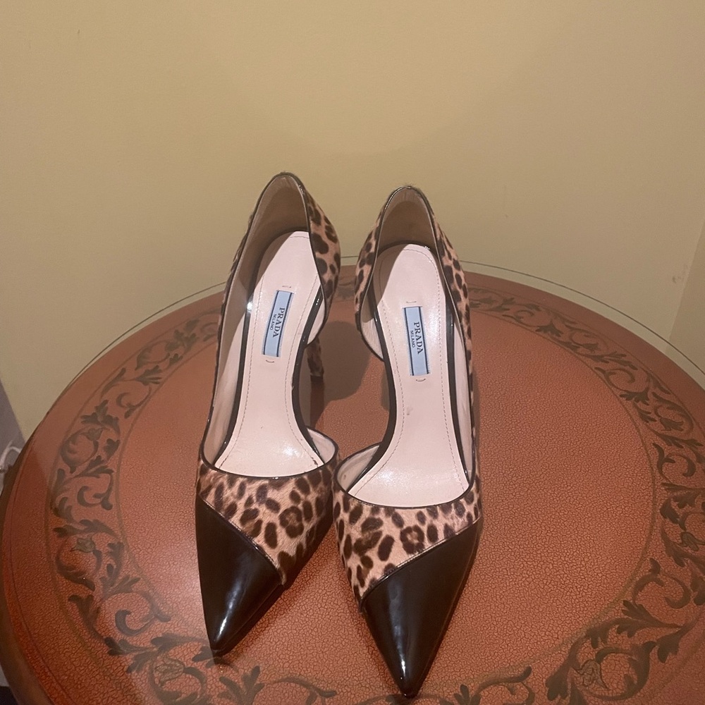 Black and brown Prada high hill shoes.